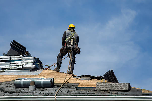 Professional Roofing technician working in Melbourne, IA